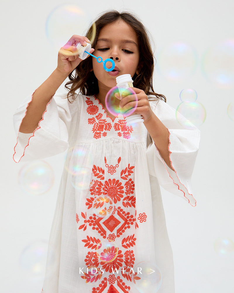 Kids Arabella V- Neck Embroidered Dress In White. Copy on image 'Kids Wear'.