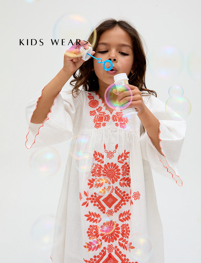Kids Arabella V- Neck Embroidered Dress In White. Copy on image 'Kids Wear'.