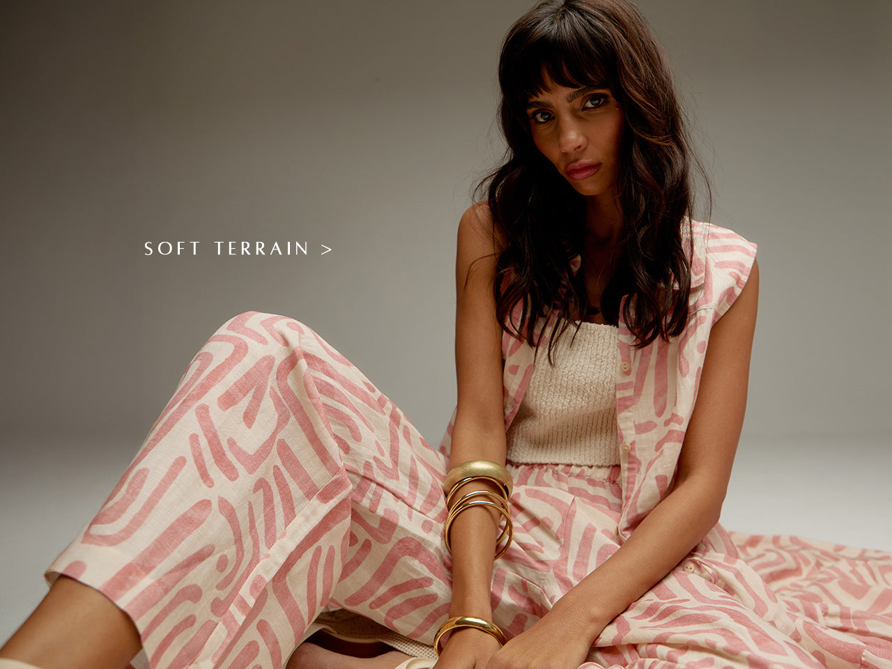 Model pairs our Holly Tiered Warhol Print Maxi Dress In Multi, with matching Pop Wide Leg Warhol Print Trouser In Multi. Copy on image 'Shop Soft Terrain'.