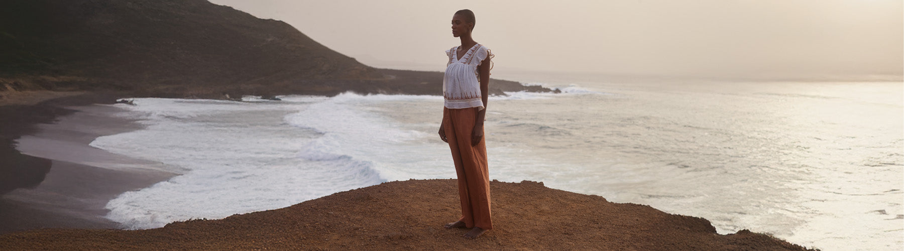 Model styles the Mariana Flutter Sleeve Embroidered Blouse In Cream with our Paulina Wide Leg Trouser In Brown